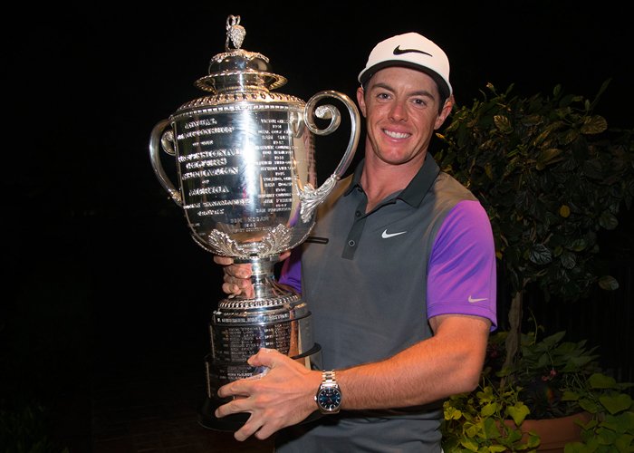 Omega Ambassador Rory McIlroy raises the Wanamaker Trophy after winning his fourth major title at the 96th PGA Championship at Valhalla Golf Club
