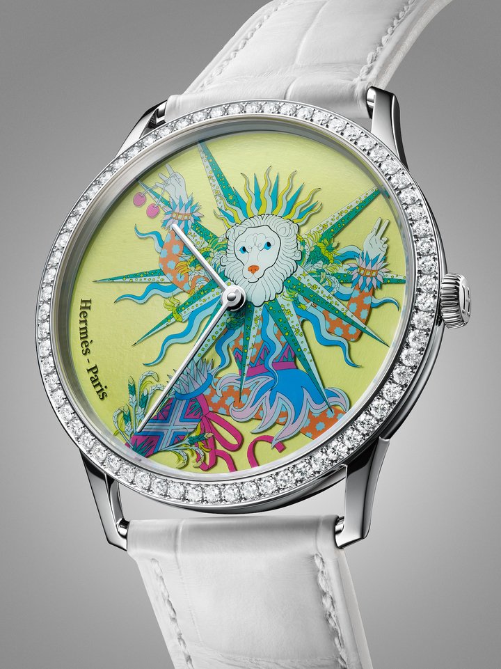 Slim d'Hermès Le Sacre des Saisons (2024). Inspired by the silk scarf of the same name, imagined by artist Pierre Marie, this 12-piece limited and numbered edition is a celebration of summer. The engraved and hand-painted sapphire crystal was developed in partnership with Olivier Vaucher and his studio. @Anita Schalefli