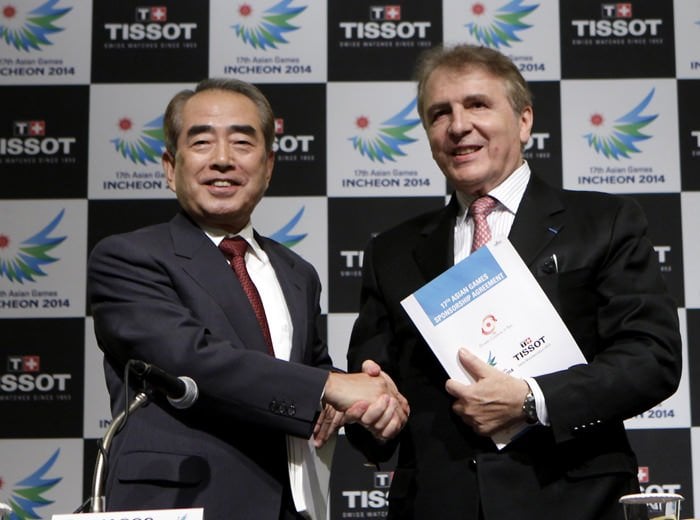 Kim Young-Soo, left, and François Thiébaud, right