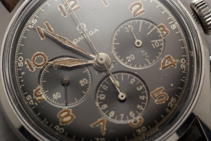 Here you can see that the radium on the numerals started to attack the dial 