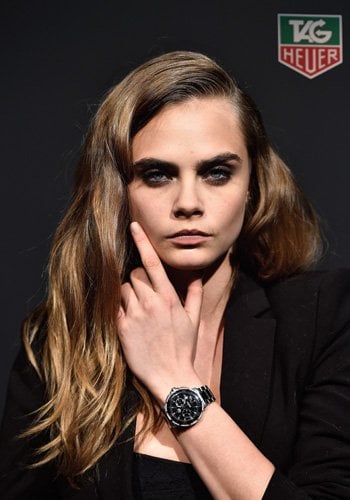Cara Delevingne wearing a TAG Heuer Formula One Steel and Black Ceramic Chronograph