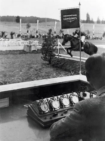 Longines has been partner in equestrian sports since 1912. Longines timing devices at a horse show in La Chaux-de-Fonds in 1955.