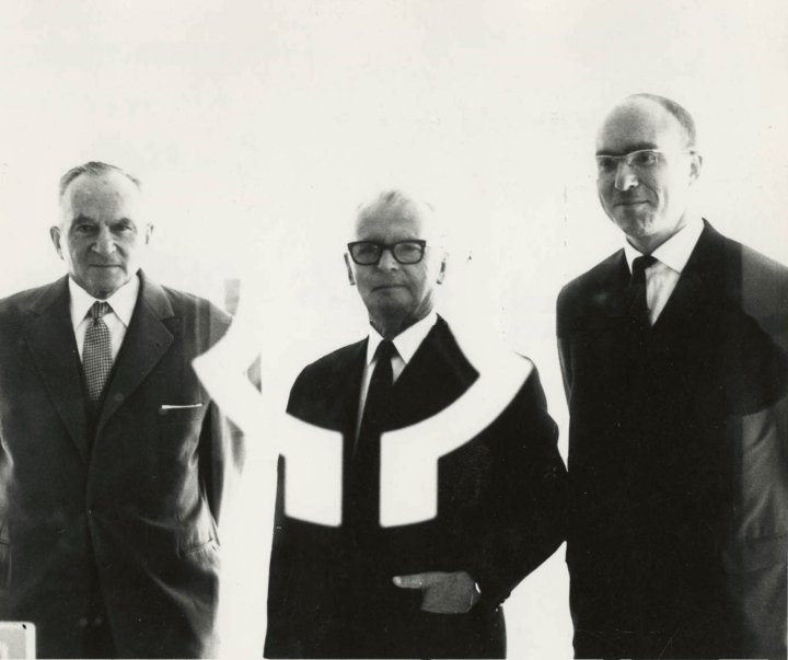 This 1965 publicity photo shows Georges Braunschweig, Fritz Marti, and Philippe Braunschweig celebrating the opening of the new Portescap factory, the largest employer in La Chaux-de-Fonds!