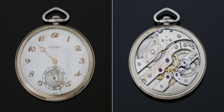 Jules Jürgensen pocket watch made in 1926, number 17006. 18K white gold case with fluted rim. 16.5 line movement with lever escapement. Bimetallic balance wheel with a fine-tuning regulator, which features a bespoke tail on the spring. Dial made from solid silver with a brushed finish and gold Breguet numerals. Yellow gold hands.