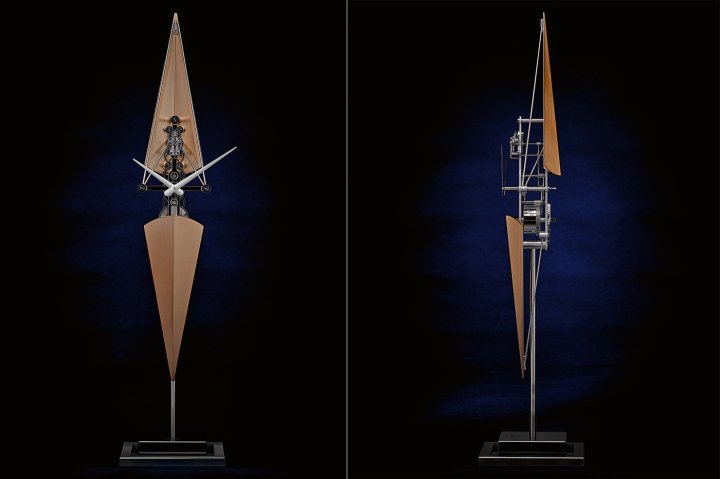 L'Epée – Regatta: L'Épée is renowned as a maker of clocks that measure time in unique, poetic and often humorous ways. The Regatta is a prime example. Its sleek, elongated form appears to hang in space. Inspired by sculls, it captures the grace and power of these water craft. This vertical clock stands 518mm high and provides eight days of power reserve. The vertically aligned rhodium-plated gears are in full view, measuring time with Swiss precision. Offered as six limited editions of 99 pieces each, in champagne, silver, black, red, green or blue. $$$
