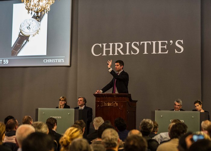 Thomas Perazzi, Senior Specialist at Christie's watch department, selling the top lot of the evening, the ref. 2499 pink gold for SFr. 2,629,000
