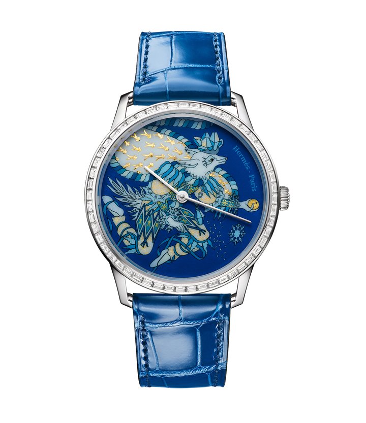 Slim d'Hermès Le Sacre des Saisons (2024). The dial for the Winter model in miniature enamel painting and paillonné enamel was created in collaboration with Ateliers Blandenier. A 12-piece limited and numbered edition. @Anita Schalefli