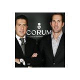 Ben Ainslie presents his olympic medal to Corum CEO 