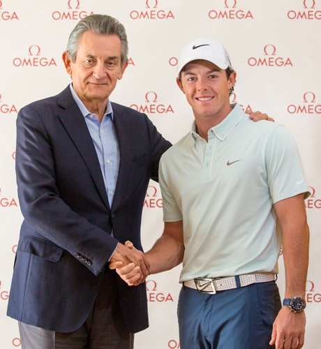 Omega president Stephen Urquhart, left, and golfer Rory McIlroy