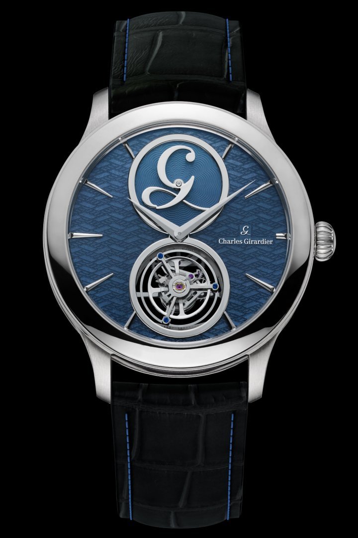 The Tourbillon Signature Mystérieuse model in white gold with a hand-made, blue cobalt dial in grand feu enamel. Two mobiles move in opposite directions depending on the position in which the watch is held.