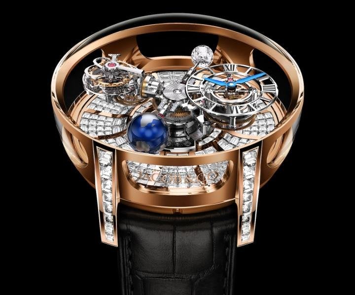 The Astronomia Tourbillon Baguette connects the Astronomia high- complication model with Jacob & Co's singular gem-setting know-how. It is a cinematic sculpture animated by a four-arm movement construction that rotates and floats through the sapphire and diamond-bound space inside its spectacular case. A grand total of 342 invisibly set, baguette-cut diamonds adorn the dial's backdrop, while 80 invisibly set, baguette-cut diamonds make up the lugs.