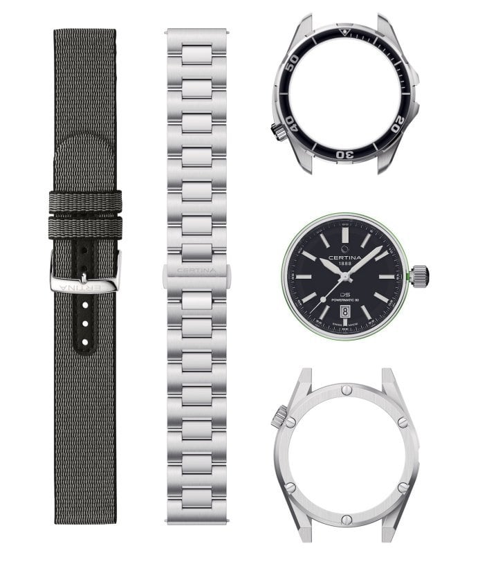 The Aqua & Sport kit includes a watch head with a black sunburst dial, two casebands – one with a black unidirectional bezel and a sports version with elongated flanks and six screws –, a dark grey #tide® textile strap and a triple-link metal bracelet.