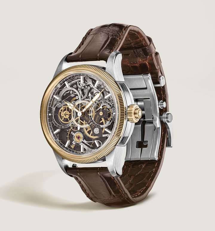 Montblanc's latest 1858 The Unveiled Minerva Chronograph showcases the Manufacture's reversed chronograph movement in a new colour scheme which sees the addition of a yellow gold 750/1000 (18 karat) fluted bezel and brown-coated bridges and plates that complement the yellow gold-coloured gear train on the movement. Like the MB M16.26, this monopusher calibre has been flipped over to display all the mechanical action on the dial side of the watch. At first glance, the viewer may think it is a skeletonised movement, but a closer look reveals that this chronograph movement is on full display on the dial side. 