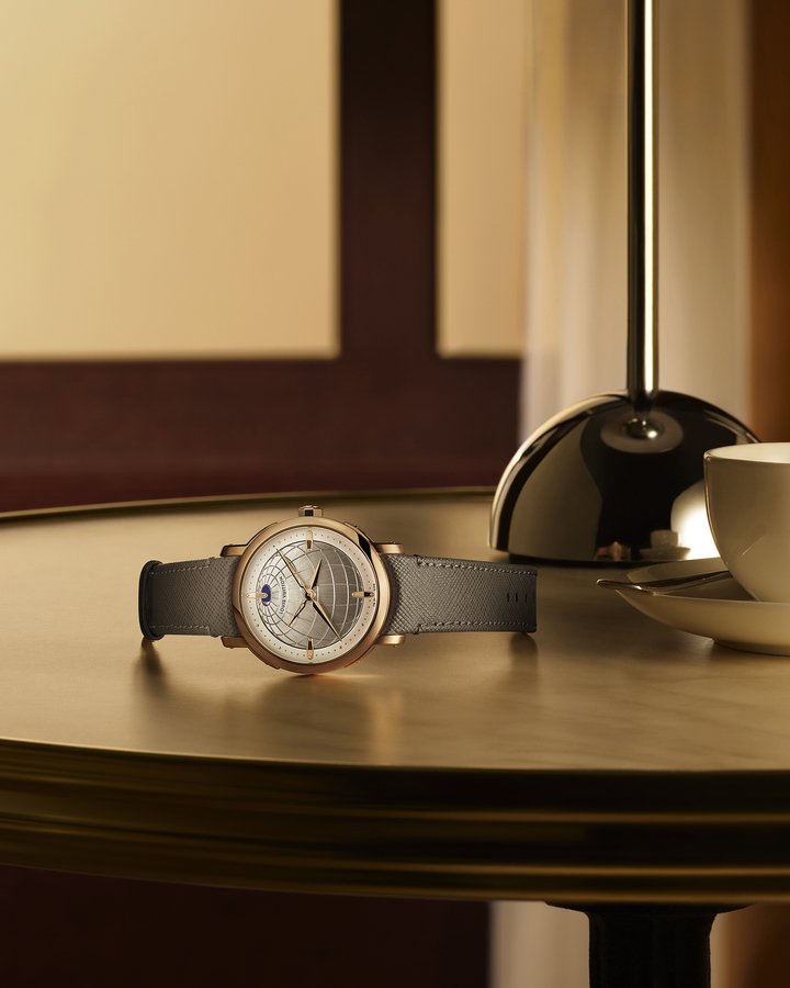 The Twin Zone features the addition of an independently adjustable minute hand, enabling precise, minute-by-minute setting across all global time zones, including those with non-standard offsets. The solid hands indicate local time, while the skeletonized hands display home time.