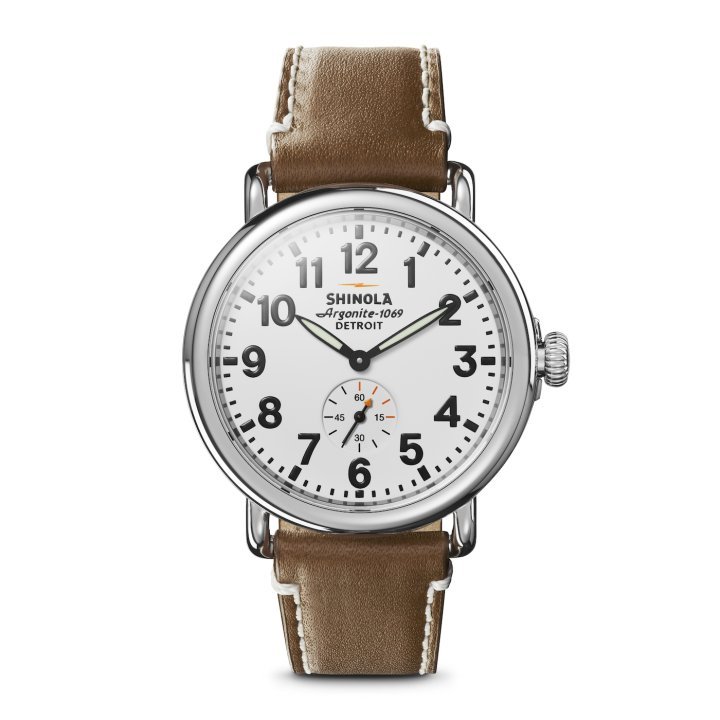 Black Arabic numerals and indices stand sharply against a clean white dial while a sub dial punctuates the look of the Runwell, Shinola's iconic design.