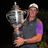 Omega Ambassador Rory McIlroy raises the Wanamaker Trophy after winning his fourth major title at the 96th PGA Championship at Valhalla Golf Club