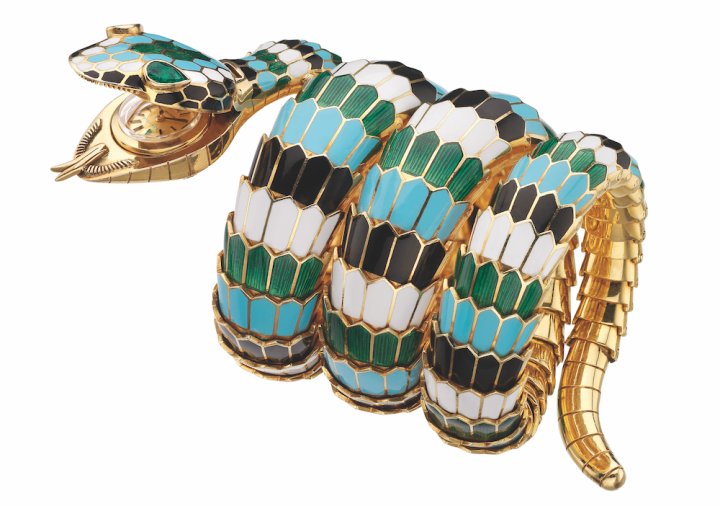 Bulgari Serpenti bracelet watch in golds with polychrome enamel dial and emeralds, 1967