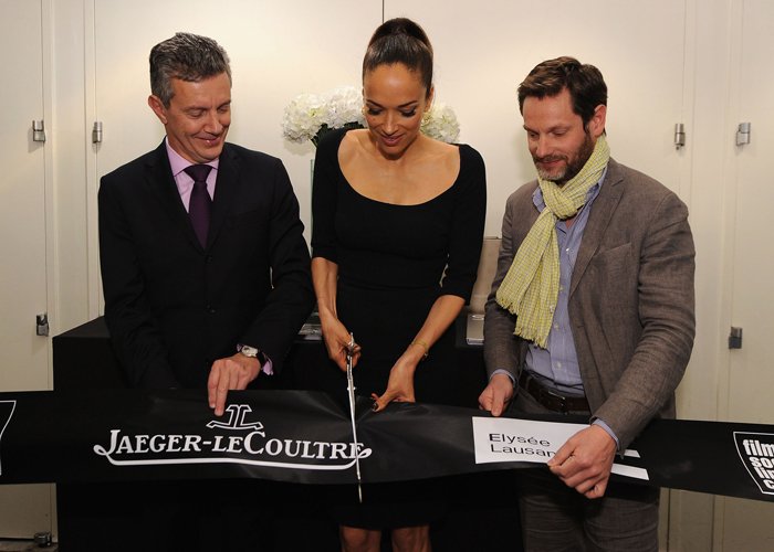 Carmen Chaplin cuts the ribbon at the Musée de l'Elysée with Jaeger-LeCoultre CEO Daniel Riedo and Museum Director Sam Stourdzé