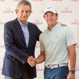 Omega president Stephen Urquhart, left, and golfer Rory McIlroy