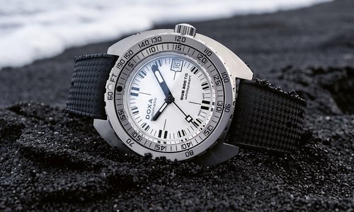 Doxa SUB 300 TI5: lighter metal, familiar character