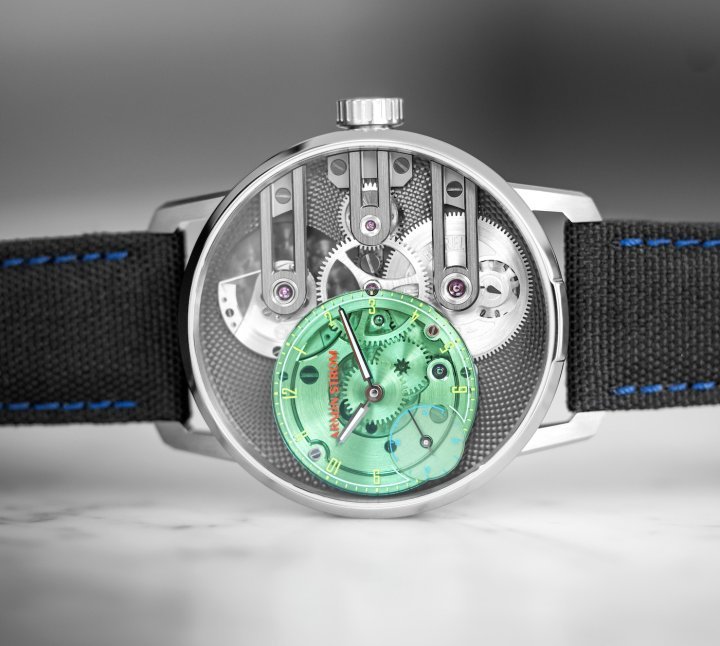 Armin Strom has produced a one-off edition of its Gravity Equal Force with a constant-force transmission for the Only Watch 2023 charity auction. It incorporates this year's colours of green for the transparent sapphire dial, red for the logo and blue for the strap stitching.