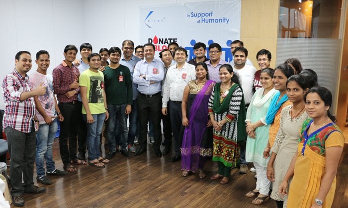 The Kiran Gems team and donation volunteers