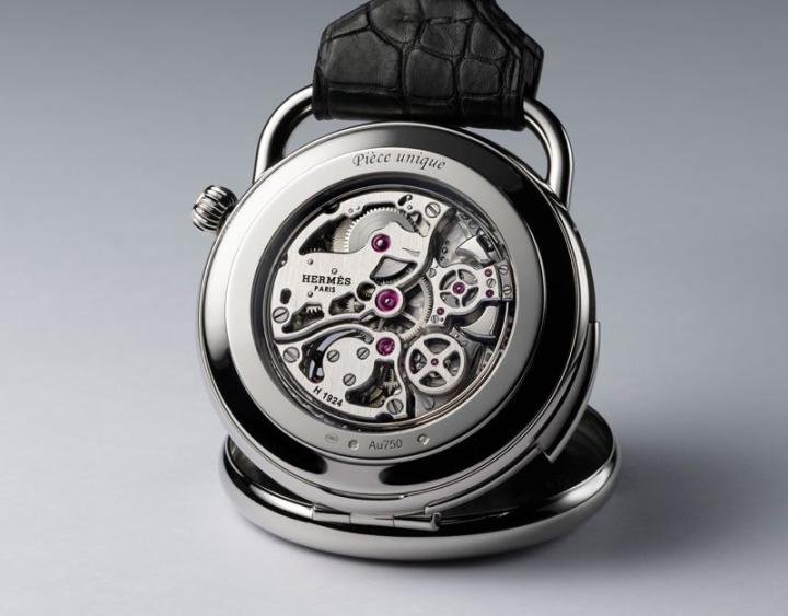 The Hermès H1924 flying tourbillon minute repeater movement in its white gold case. 