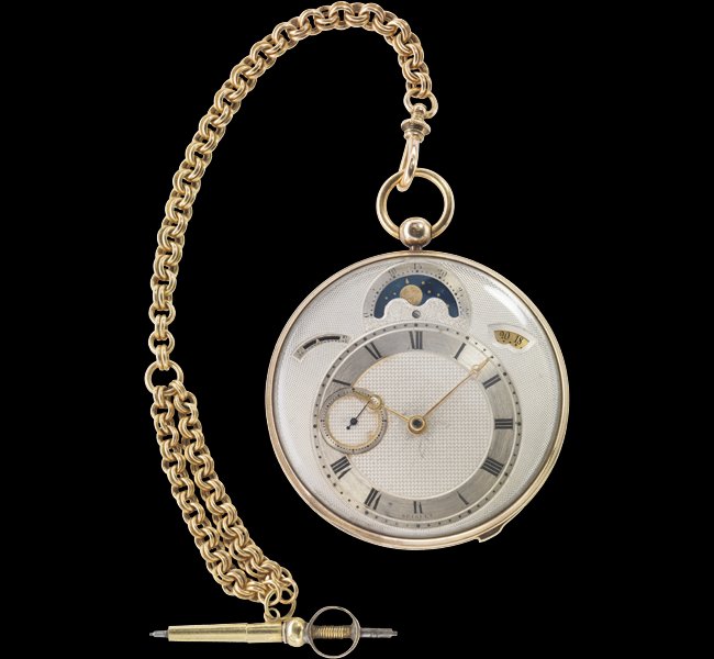  Breguet No. 3833, sold 12 May 1823. Gold case, off-centre silver dial with windows for the date and moon phases, off- centre small seconds, lever escapement.