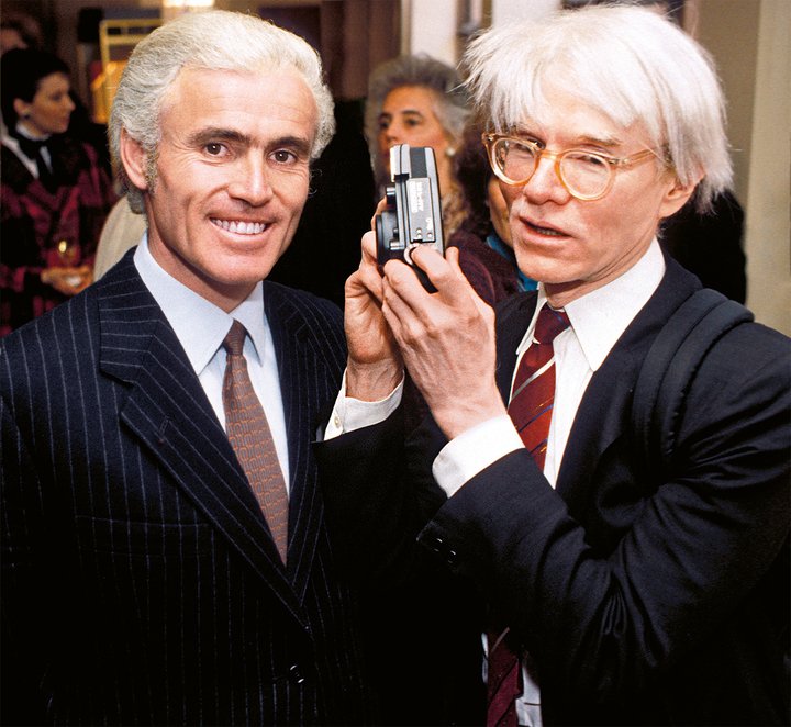 Andy Warhol preparing to photograph Yves Piaget during the Princess Grace Foundation gala in Washington, DC, 1984.