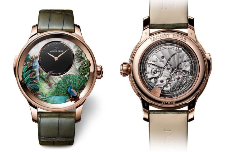 The Tropical Bird Repeater model with hand-engraved and hand-painted white mother-of-pearl dial and black onyx subdial. Automaton animation with peacock, tropical leaves, hummingbird, toucan, dragonflies and waterfall.