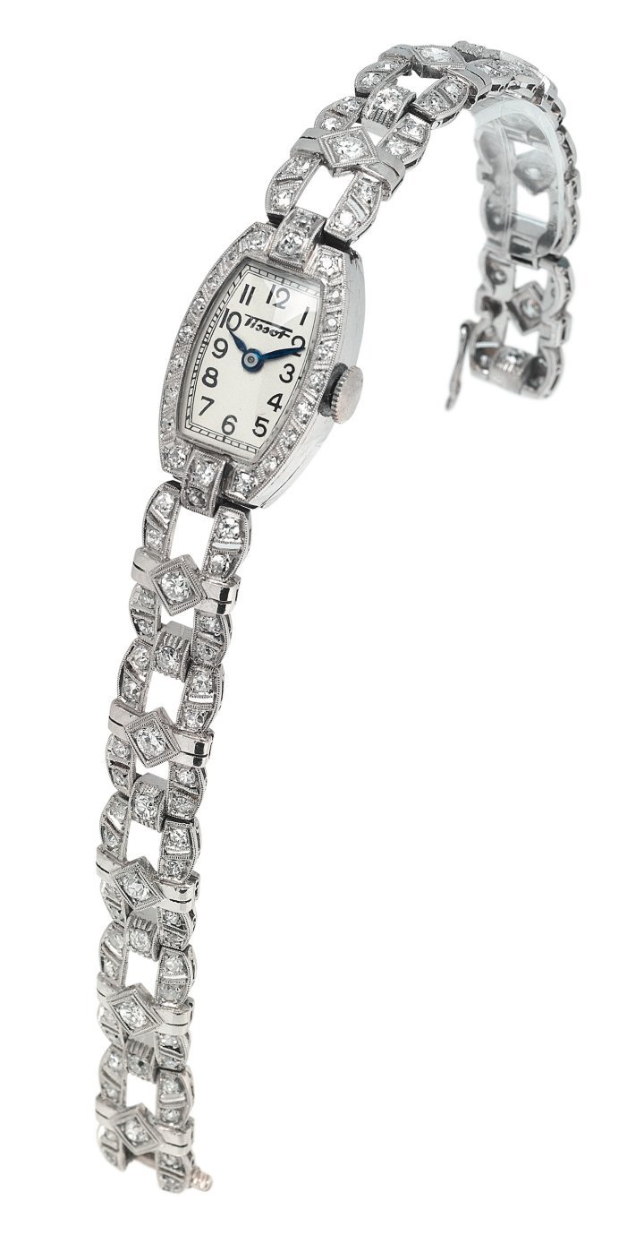 A gold, diamond-set wristwatch for ladies, dated 1939. Tissot Museum Collection. E00012424. 