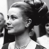 At a reception in Philadelphia, she is wearing a Cartier necklace in platinum and diamonds, that she received as a wedding gift in 1956.