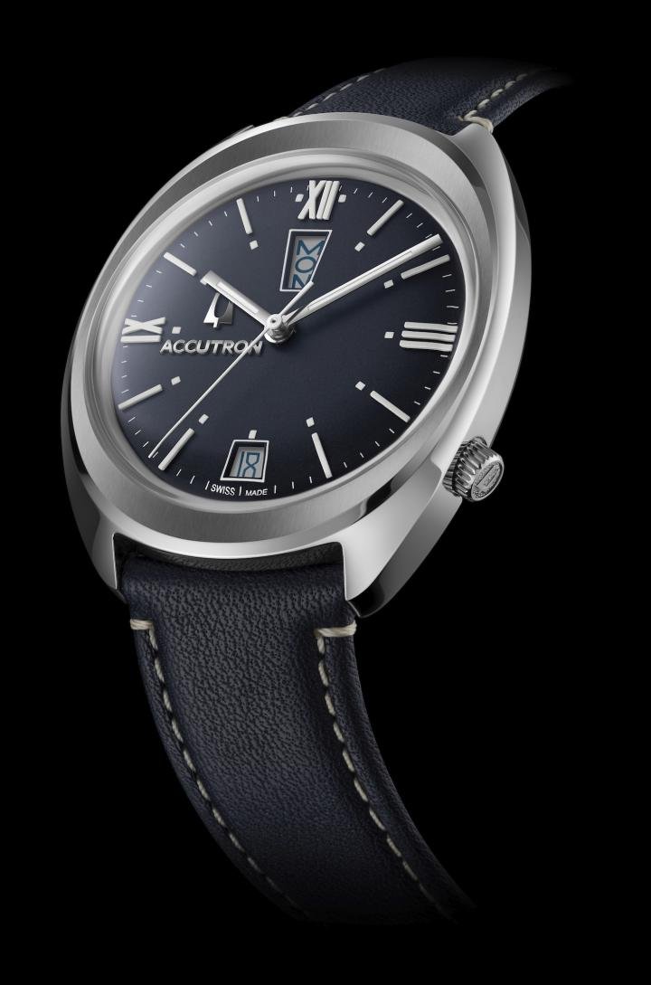 The reissue of the Day and Date “Q” model with a streamlined oval case, crown at 4 o'clock and dark blue dial