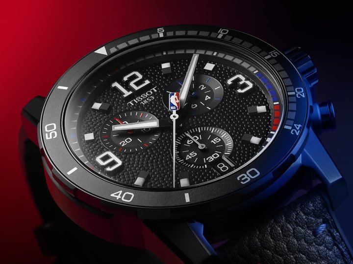 The Tissot Supersport NBA Special Edition is inspired by the sport's aesthetics: the 45mm black PVD chronograph features jersey-style numeral indexes on the dial, basketball texture details, and a bezel referencing the 24 second shot clock.