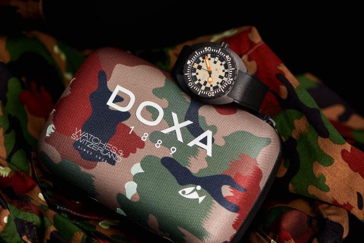 Each Doxa Army Watches of Switzerland model comes in packaging designed specifically for this edition and sporting the original camouflage pattern used by the Swiss Army at the time the watch was first issued. The box also includes two straps: one made from black FKM rubber and one NATO strap with a camouflage pattern.