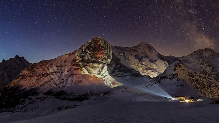 Gerry Hofstetter's projection of a giant tiger onto the Eiger. The Swiss artist, who creates light art all over the world, is sponsored by Swiss Military Hanowa.