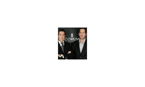 Ben Ainslie presents his olympic medal to Corum CEO 