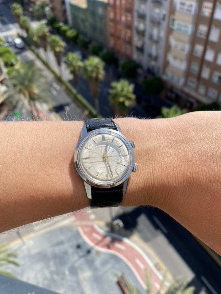 Adam Lassner above the streets of Valencia (Spain), where he studied, wearing a Benedict Watch he discovered.