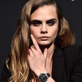 Cara Delevingne wearing a TAG Heuer Formula One Steel and Black Ceramic Chronograph