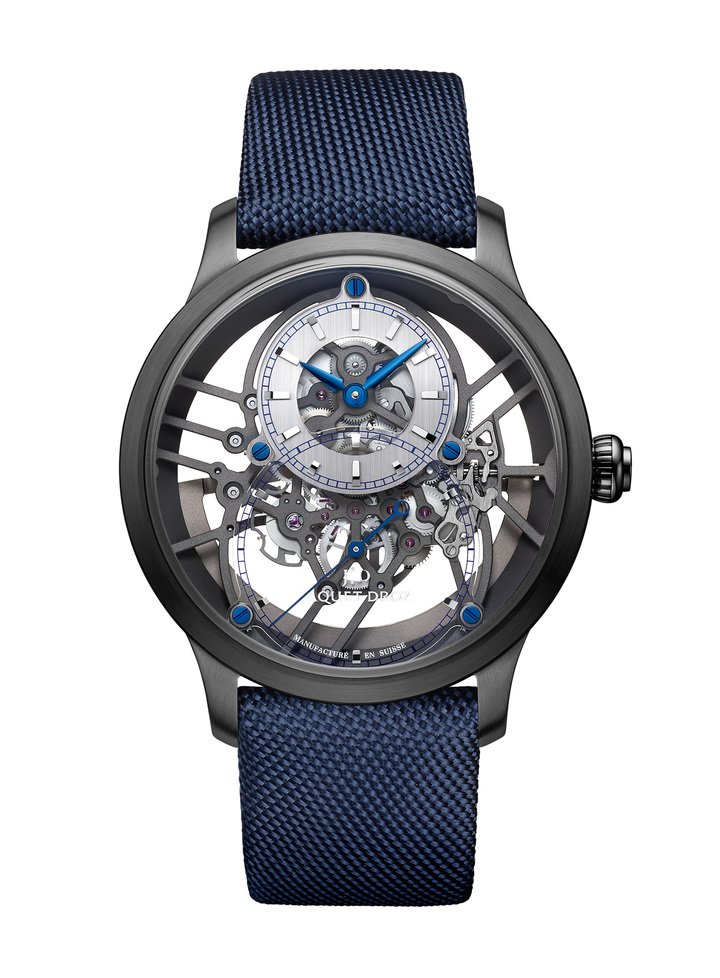 The Grande Seconde Skelet- One Ceramic's movement features blued steel screws to join the 18-karat white gold hour circle and the sapphire dial. The movement plate stretches all the way around the case, which itself does away with the casing ring. With this new construction, the gear train is entirely suspended and fixed to the skeletonised bridges that cross over the movement.