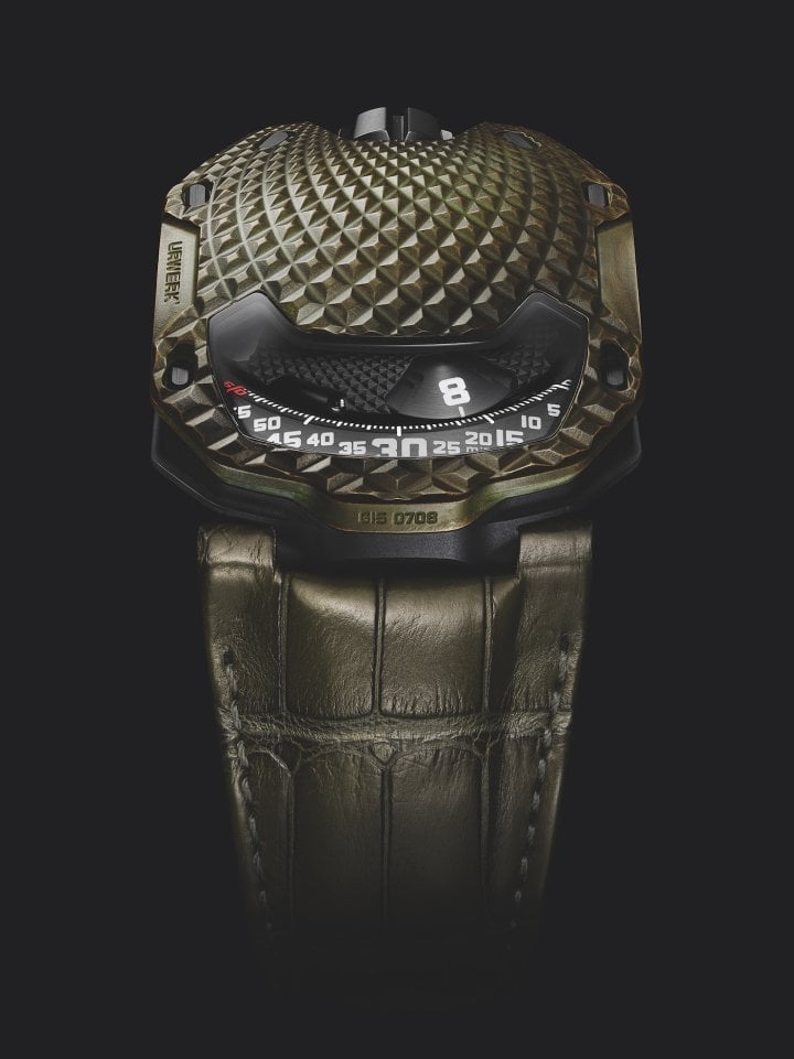 URWERK UR-105M TRINITY Switzerland, 2023 Hand-painted bronze and black PVD titanium back Limited edition: 1/1 Ref. no. V15 0708 Includes original T. rex bone material from TRX-293 TRINITY Power reserve: 42 hours. Supplied with original box and papers 39.5 × 53 × 16.8 mm