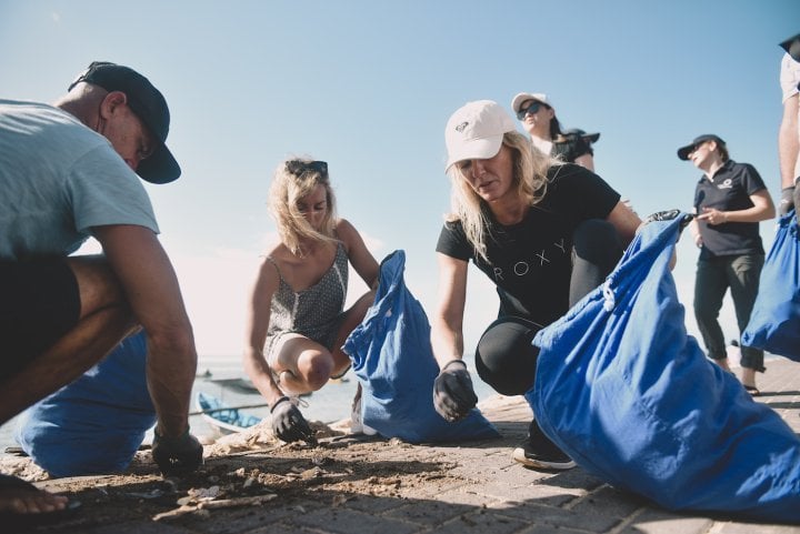 Breitling employees taking part in a beach clean-up