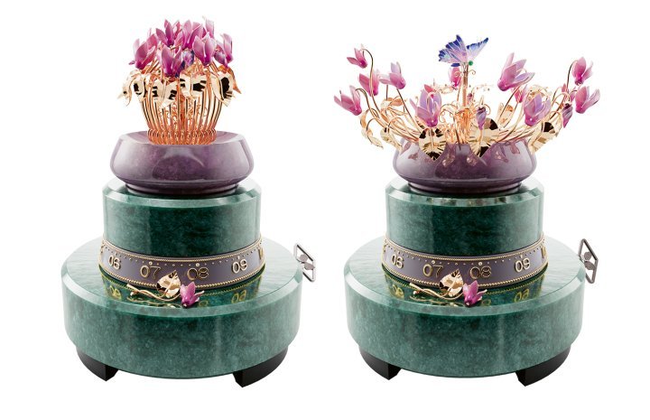 The Éveil du Cyclamen automaton stirs to life on a base made from two pieces of green aventurine and a bowl of purple jade. 