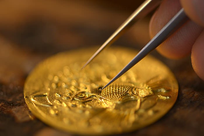 A Cartier Artisan Working on the Panther with Granulation Dial © Cartier