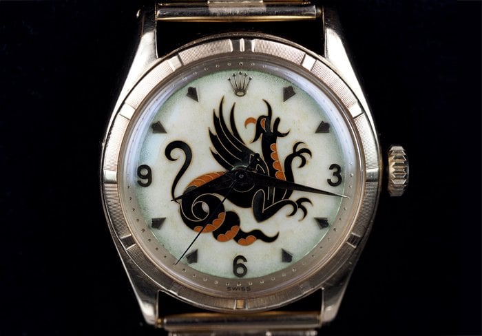 Estimate CHF 500,000–1,000,000. Sold for CHF 670,000. A highly important and most attractive yellow gold ROLEX 1952 wristwatch with cloisonné enamel dial depicting a dragon. The dial was made by one of Geneva's most acclaimed enamellers, Mrs Nelly Richard, who worked with Stern to produce the dials of some of the most sought-after Rolex watches to date.