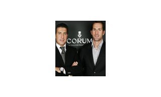 Ben Ainslie presents his olympic medal to Corum CEO 