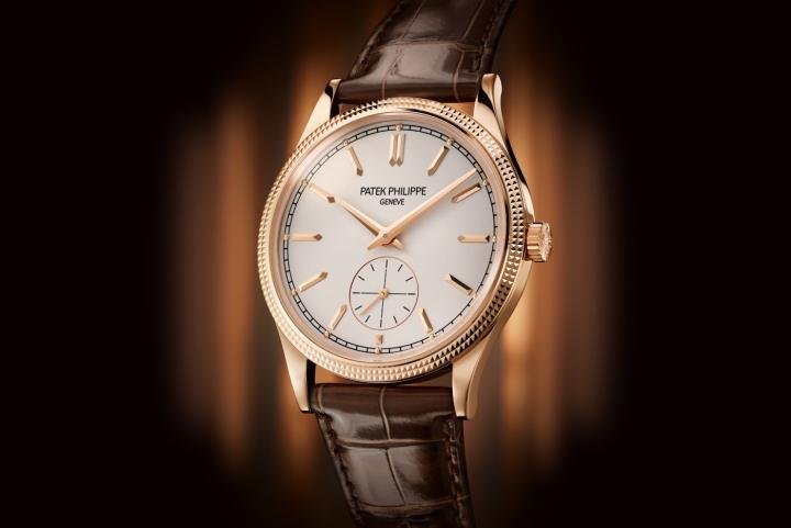 Patek Philippe's most contemporary Calatrava comes in two versions: the Ref. 6119R-001 (pictured here) combines a rose-gold case with a silvery grained dial as well as applied hour markers and hands in rose gold. The Ref. 6119G-001 in white gold subtly plays with light on a charcoal gray dial with attractive contrasts – a vertical satin finish interrupted by the snailed subsidiary seconds dial.