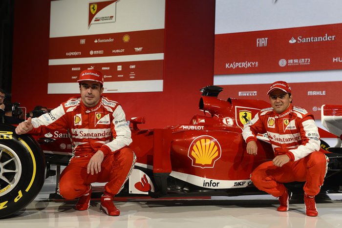Ferrari drivers Fernando Alonso, left, and Felipe Massa with the new F138 presented last week