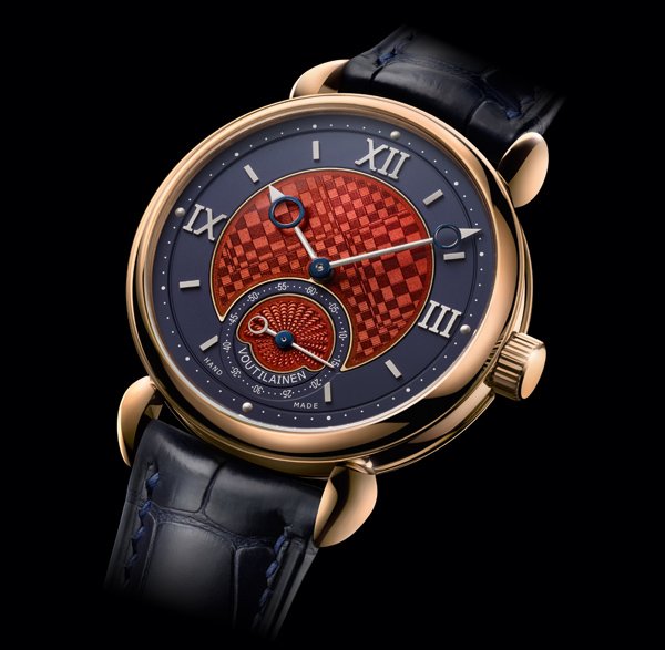 GMT Email Trompe-l'oeil by Voutilainen: The Voutilainen GMT Email Trompe-L'oeil, inspired by Vasarely, is the perfect embodiment of the extreme technical and aesthetic refinement of Kari Voutilainen's timepieces. Entirely designed, built, produced, finished and assembled in the master's own workshop, the movement has a very special and highly efficient escapement that sends a direct impulse to the balance wheel through the ruby roller.