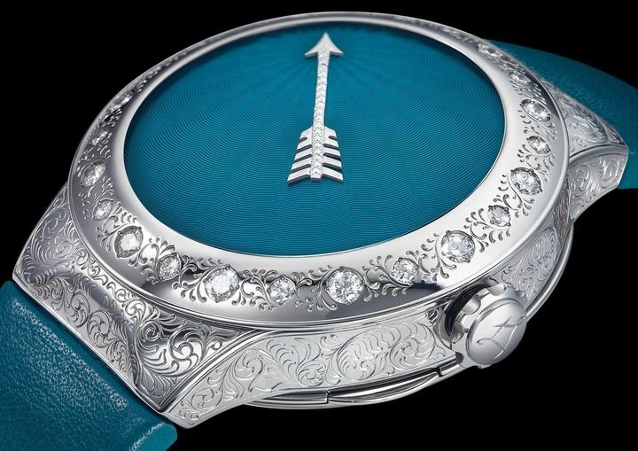 Inspired by the historical 1810 tact watch presented above, L. Leroy has created this unique piece featuring a minute repeater and a flying tourbillon. The 43 mm case is crafted from two metals. The case middle, caseback, repeater pusher, and crown are made of grade 5 titanium, while the bezel, caseback cover, and buckle are in 18K palladium white gold (PD210). The case is entirely hand-engraved with an intricate floral motif.